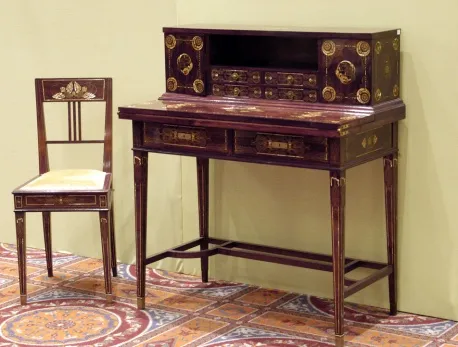 antique desk by eugenio quarti with detailed design and drawers