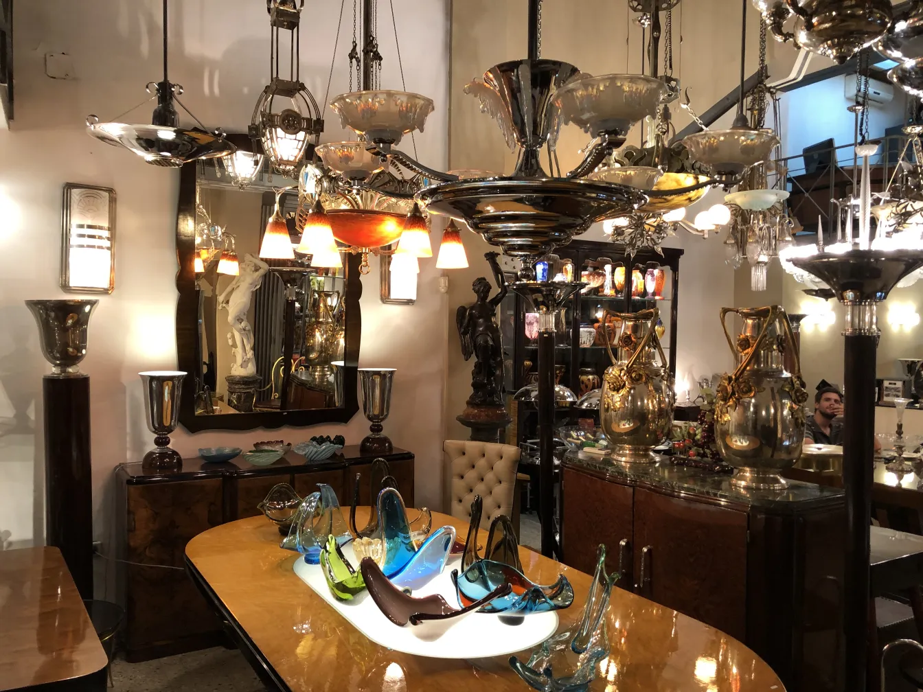 Antique decorative hanging lamp with multiple lights in an elegant setting