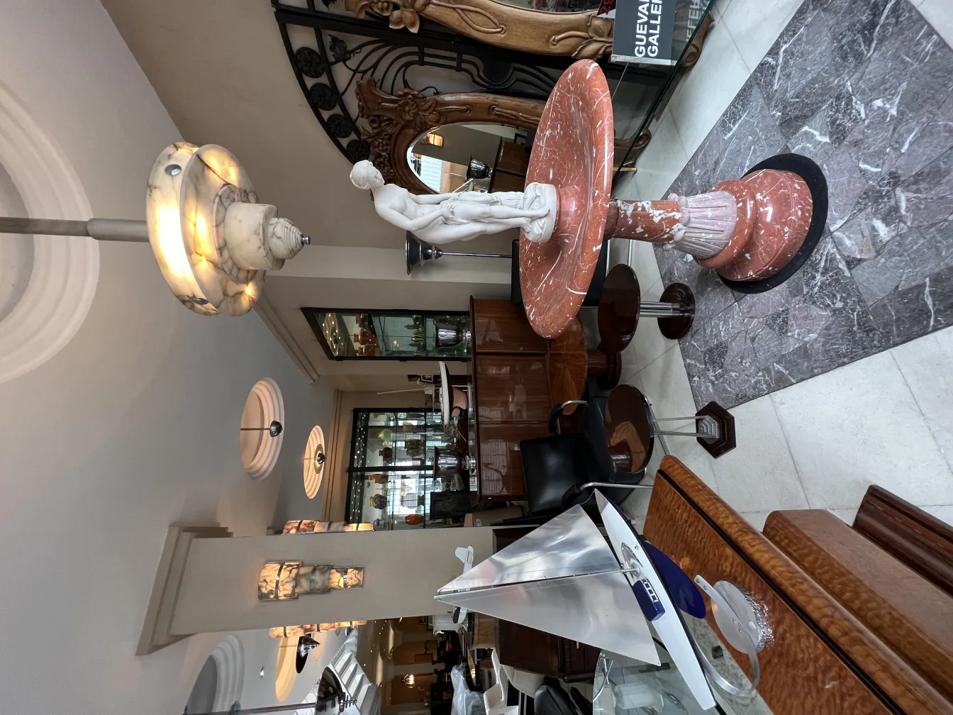 Antique hanging lamp with soft light in a cozy setting.