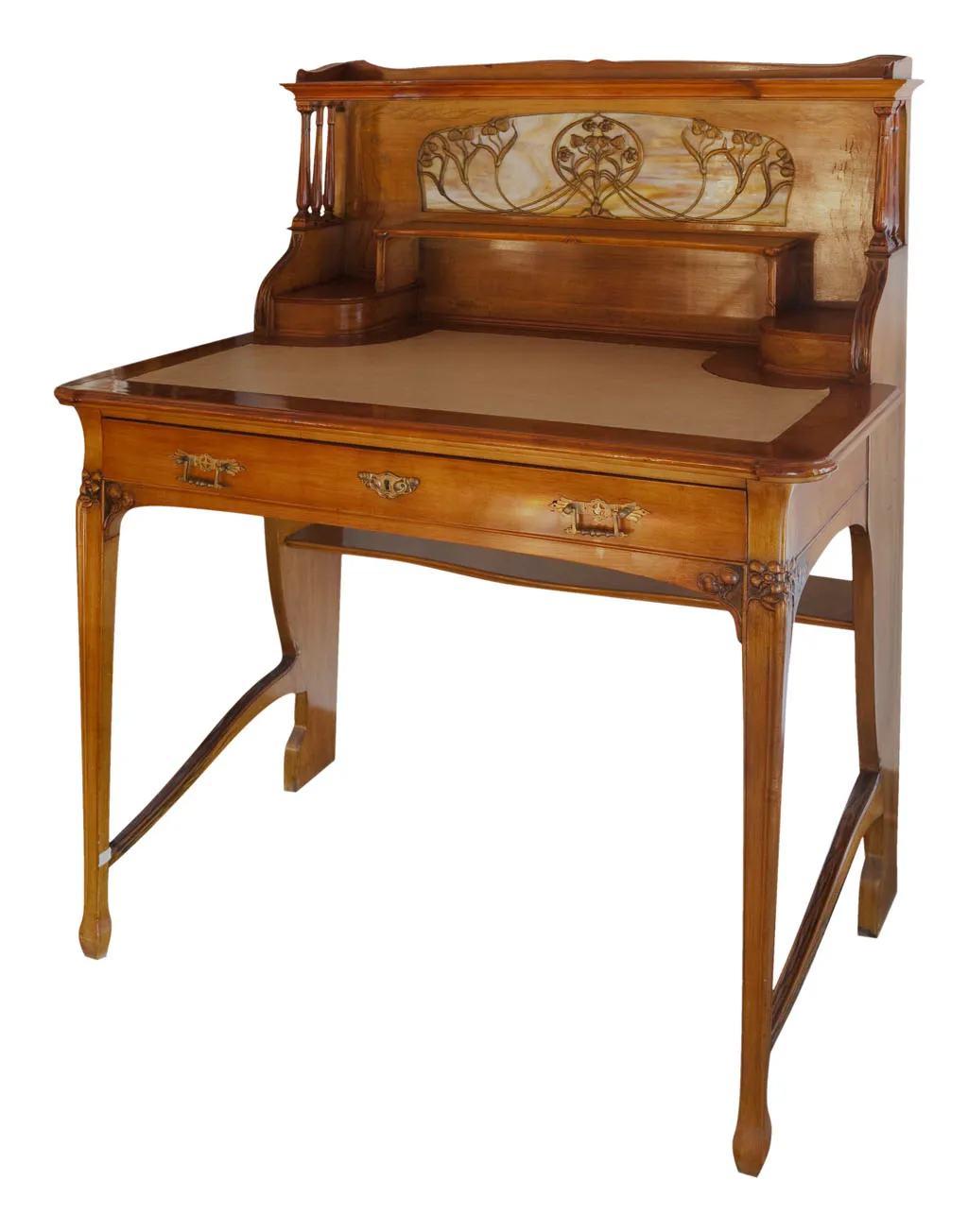 antique desk with carved details and storage space