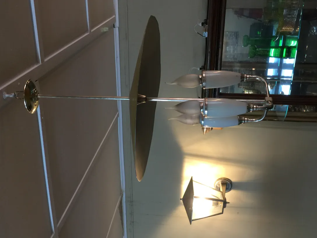 Antique hanging lamp with two lights and illuminated background