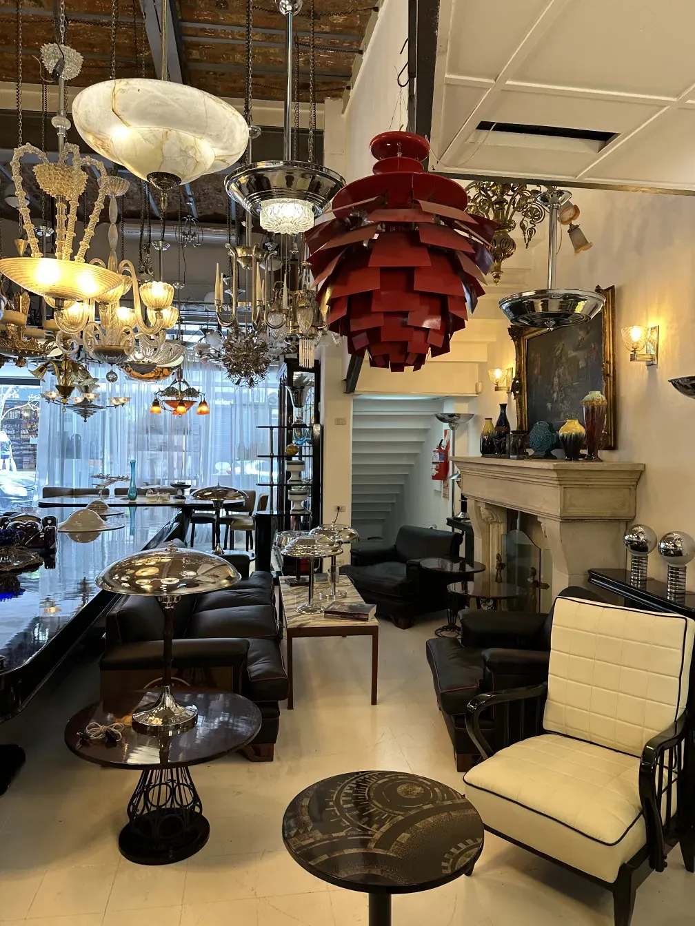 Antique hanging lamp in an elegant setting with chairs