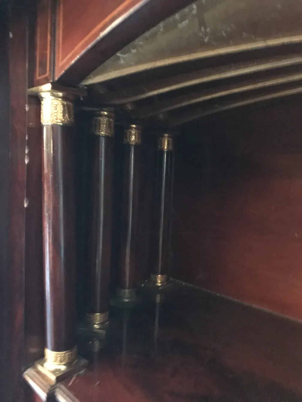 Antique desk with wooden decorated legs and elegant interior. Perfect for office or study.