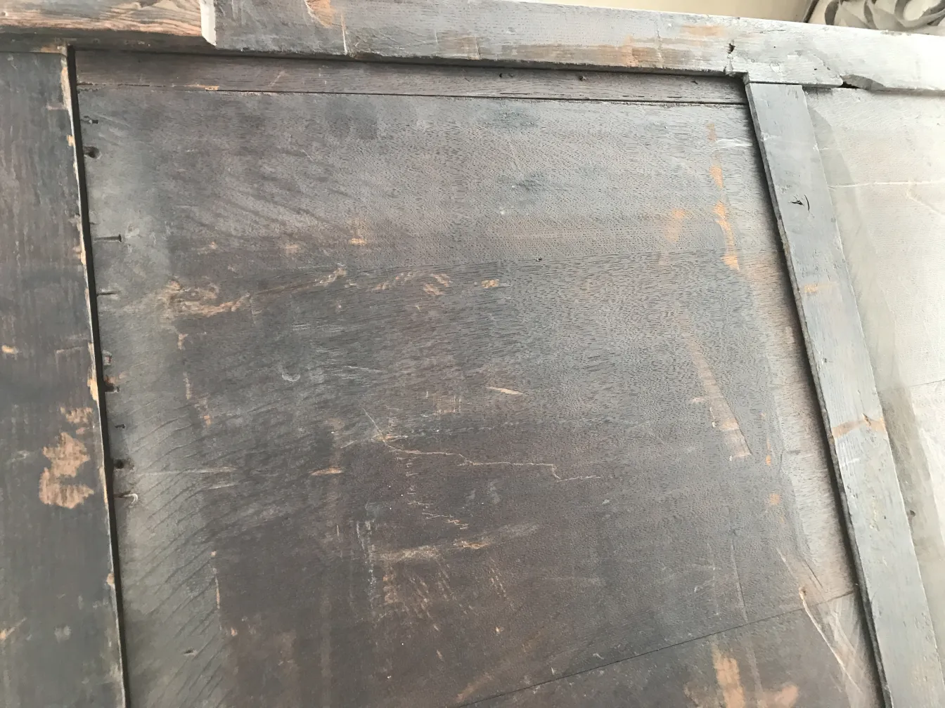 antique wooden desk with visible marks