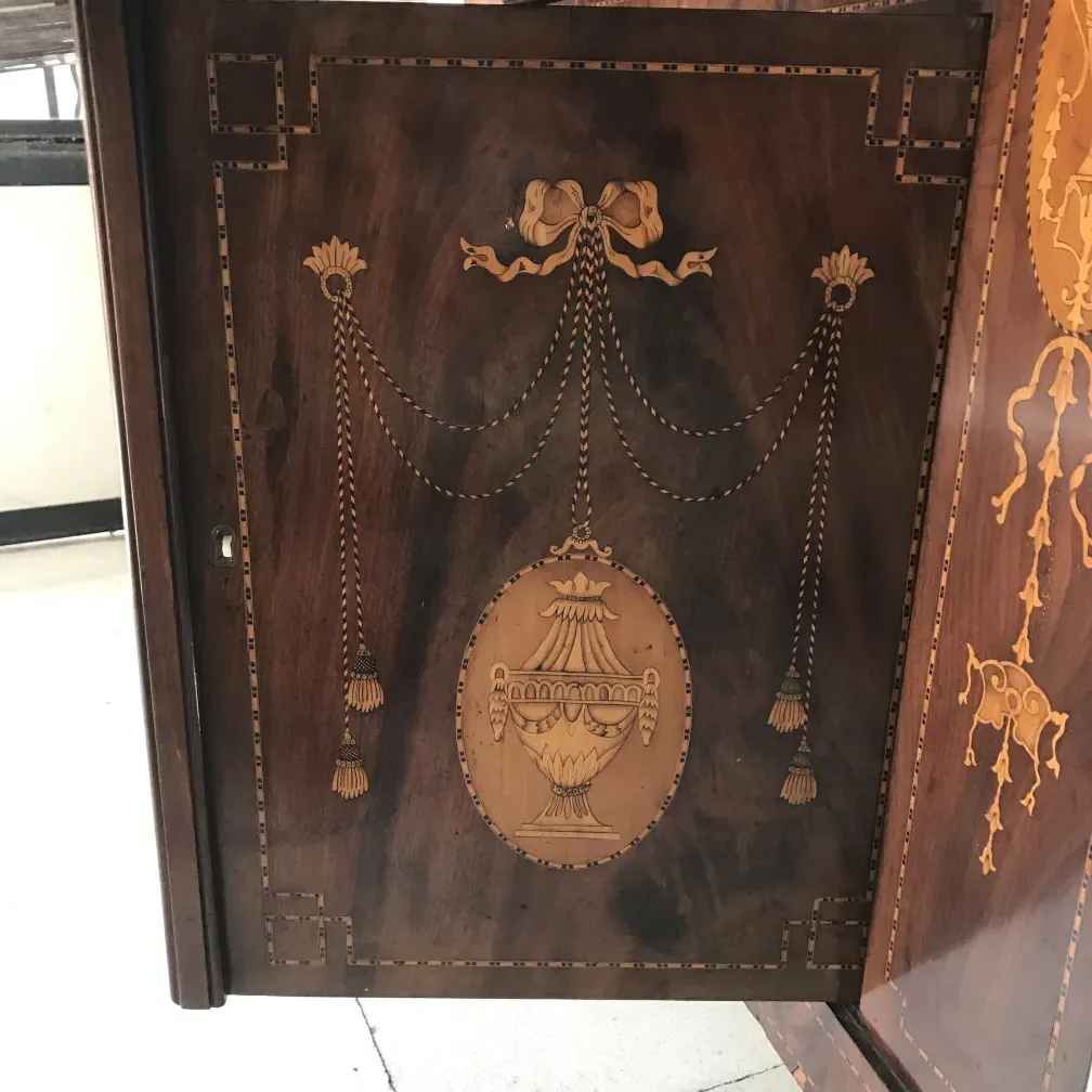 Antique desk with intricate decorations and elegant design