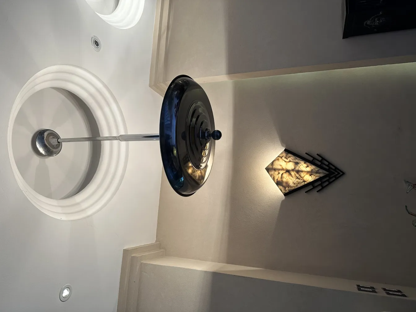 Antique hanging lamp with a shiny design in the setting