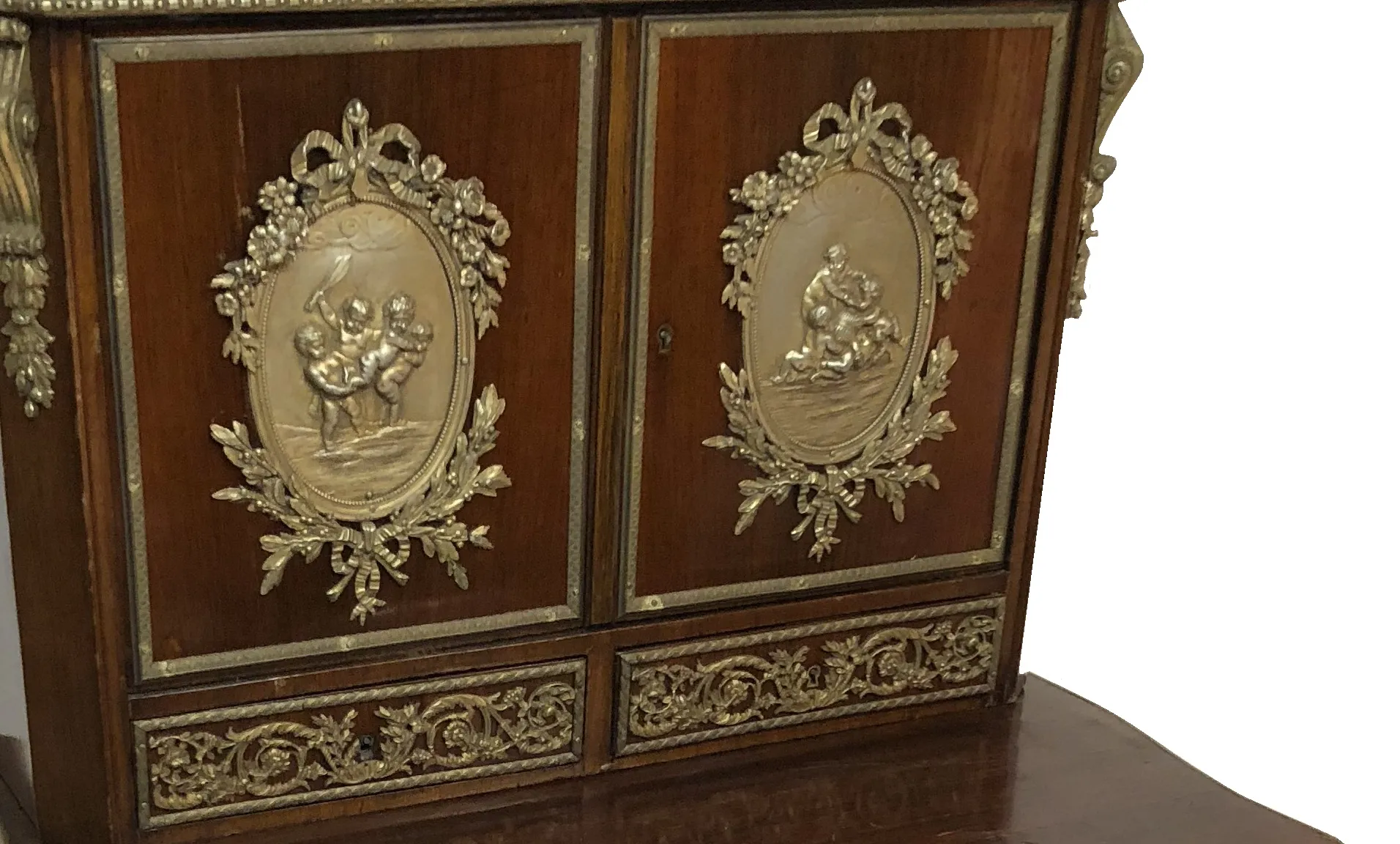 antique wooden desk with relief decorations and gold details, classic environment