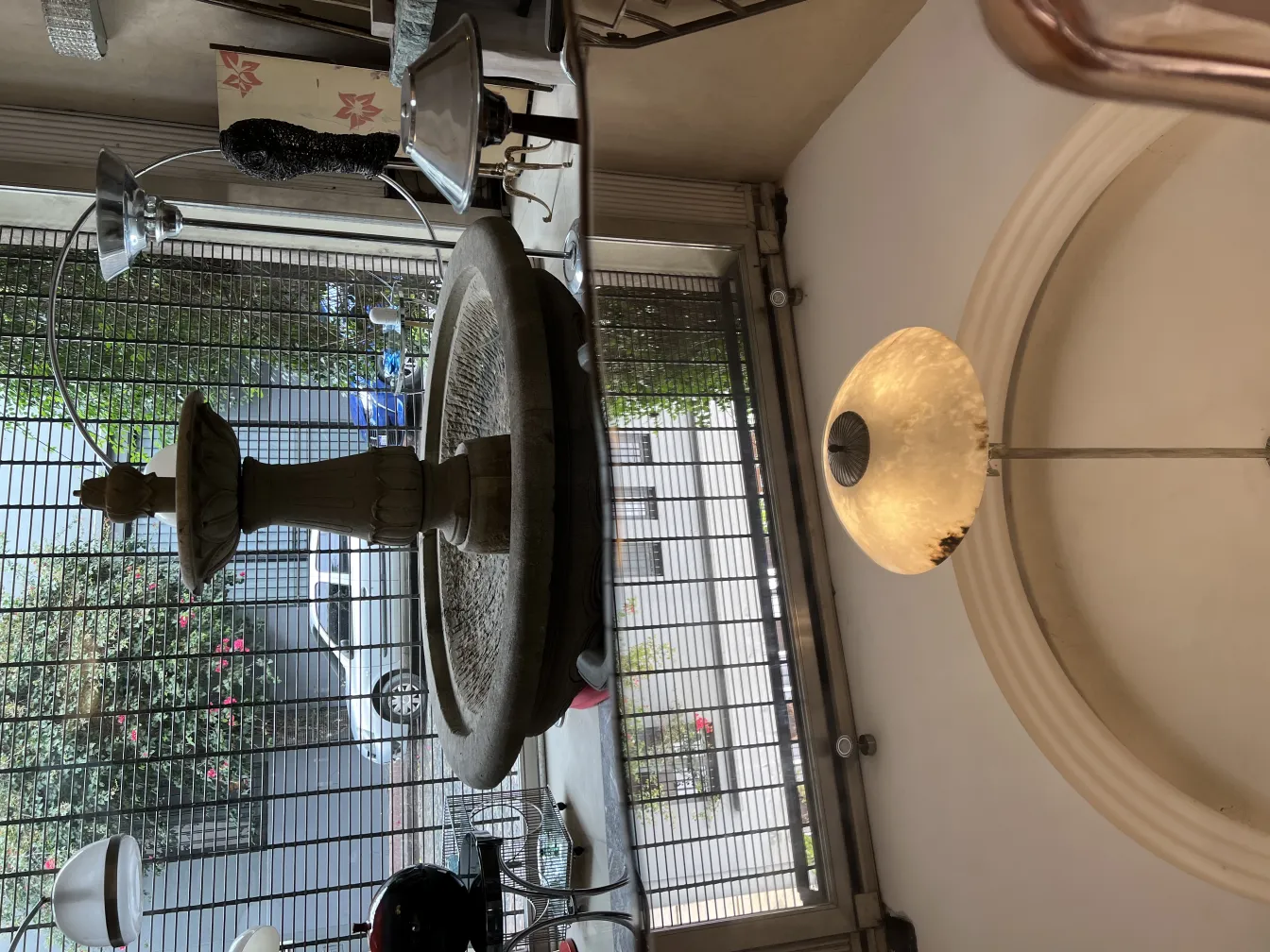 Antique hanging lamp with elegant design, seen in a cozy environment.