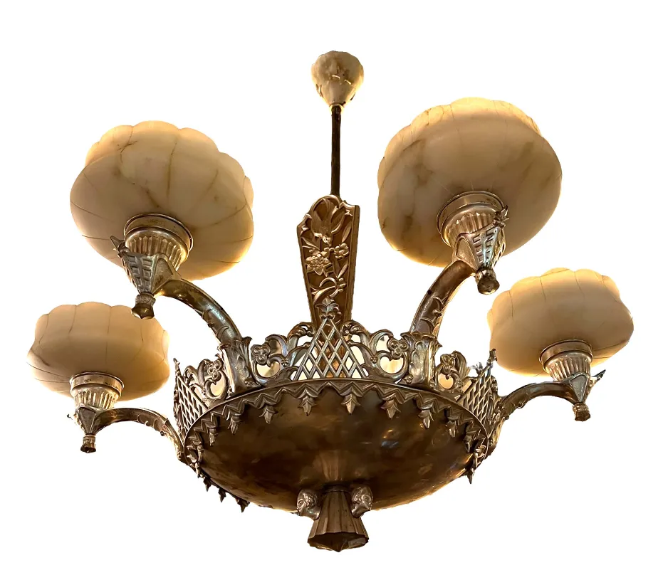 antique hanging lamp with decorative arms and alabaster shades in an elegant setting