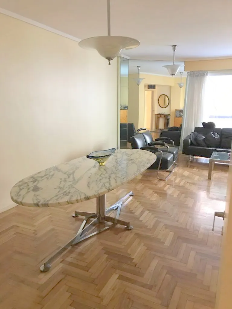 antique hanging lamp with elegant shape in an empty living room