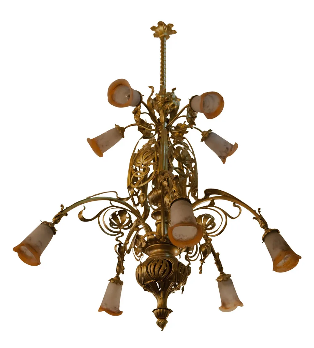 Antique hanging lamp with golden details and glass shades in classic setting