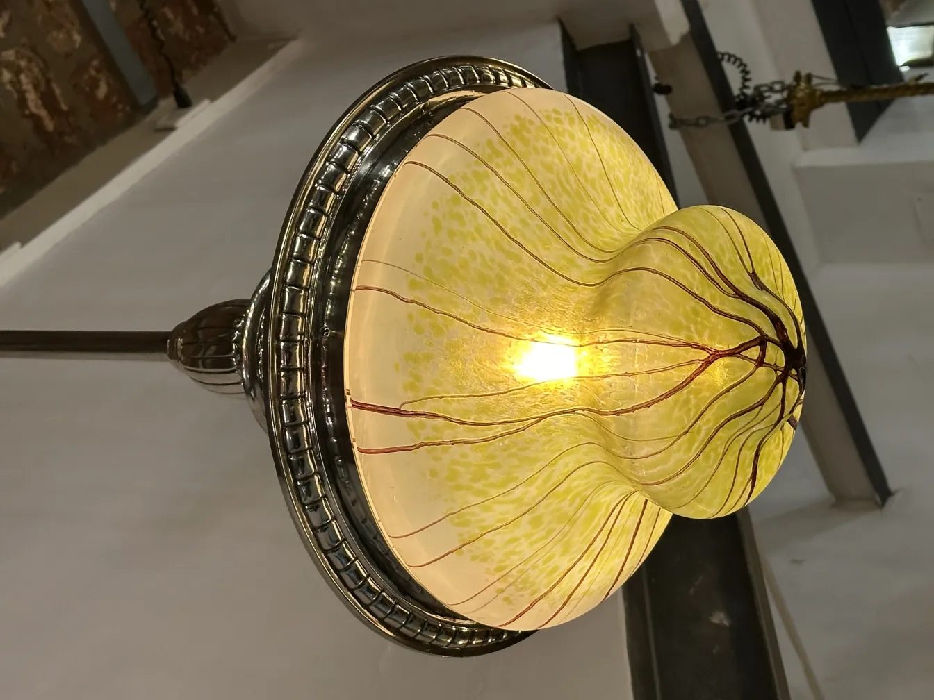Antique hanging lamp with yellow design and lines