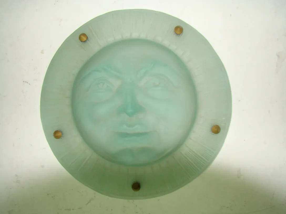 lustre ancien avec visage de lune à st louis