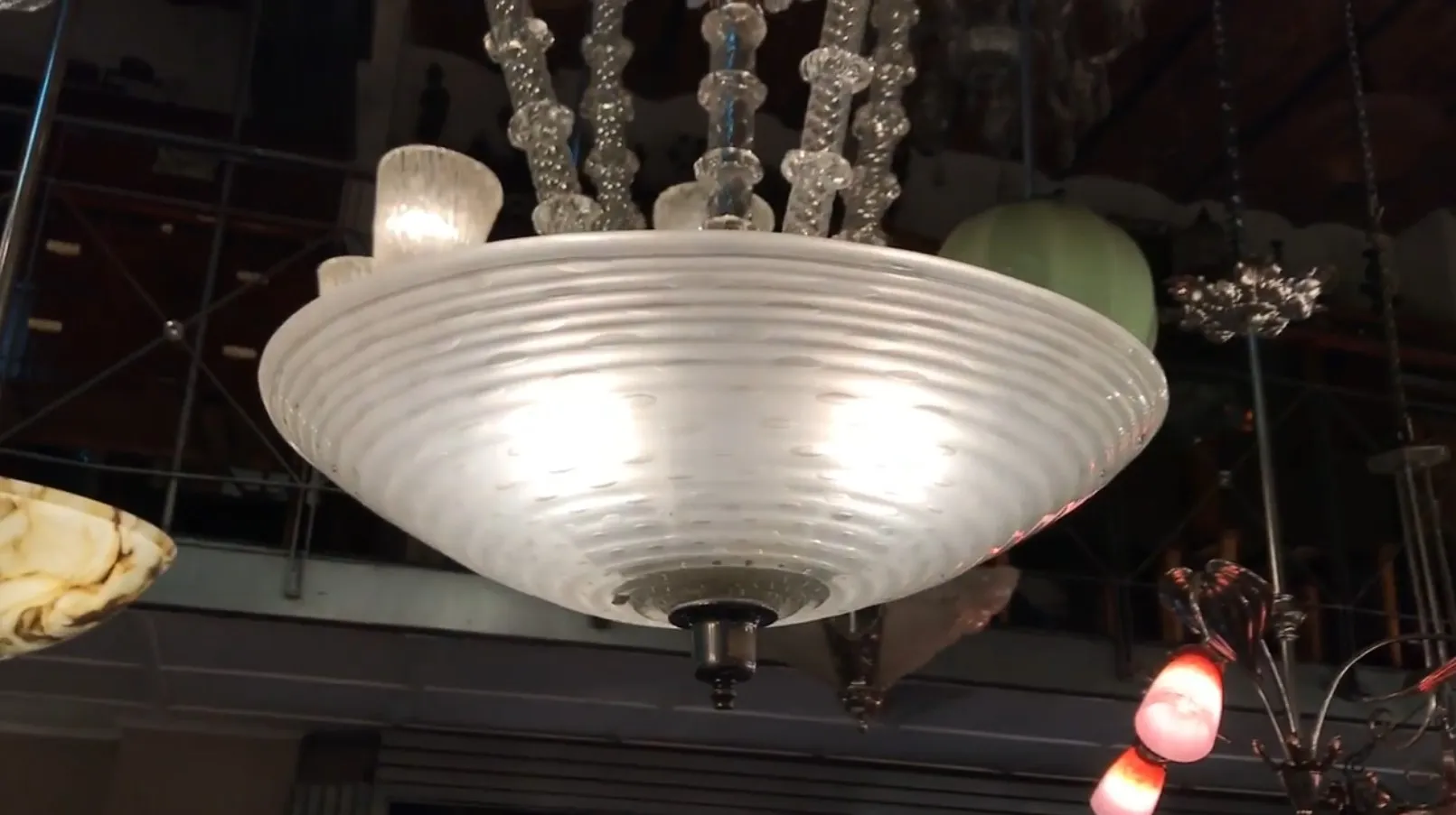 antique hanging lamp designed by paolo venini in a classy setting