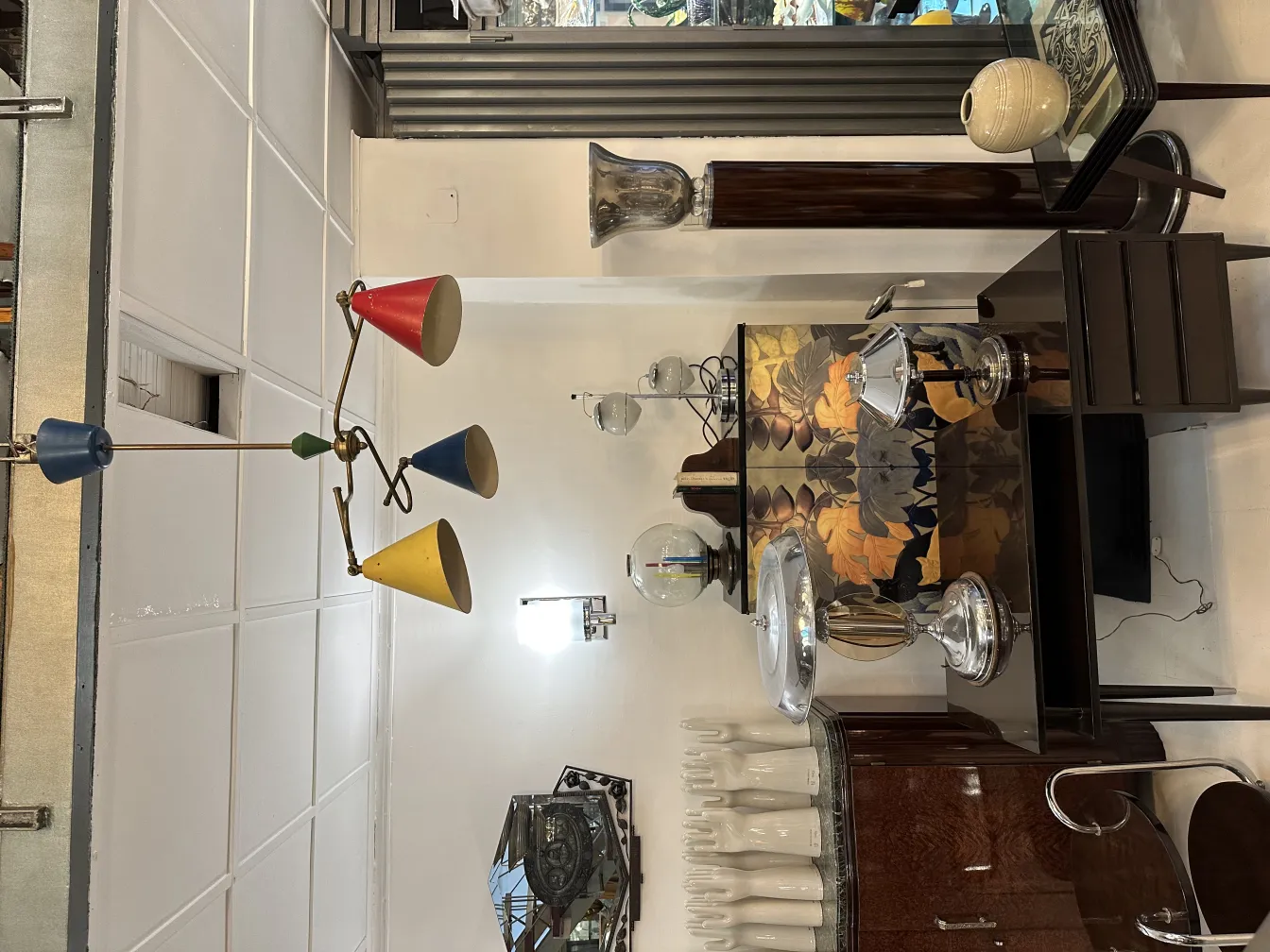 Antique hanging lamp with vivid colors in a decorative setting.