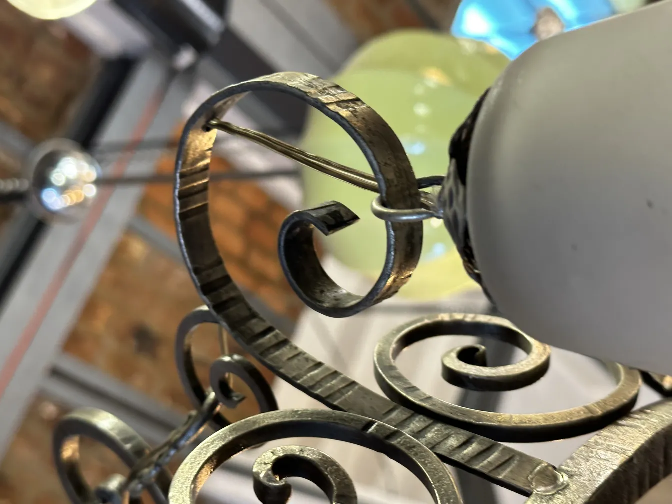 Antique hanging lamp with elegant and decorative details in a cozy environment.