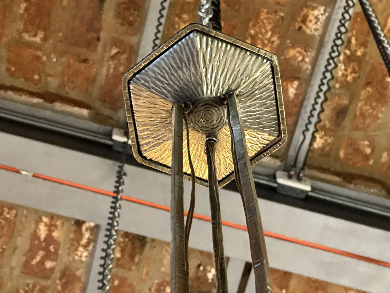 Antique hanging lamp featuring a hexagonal design.