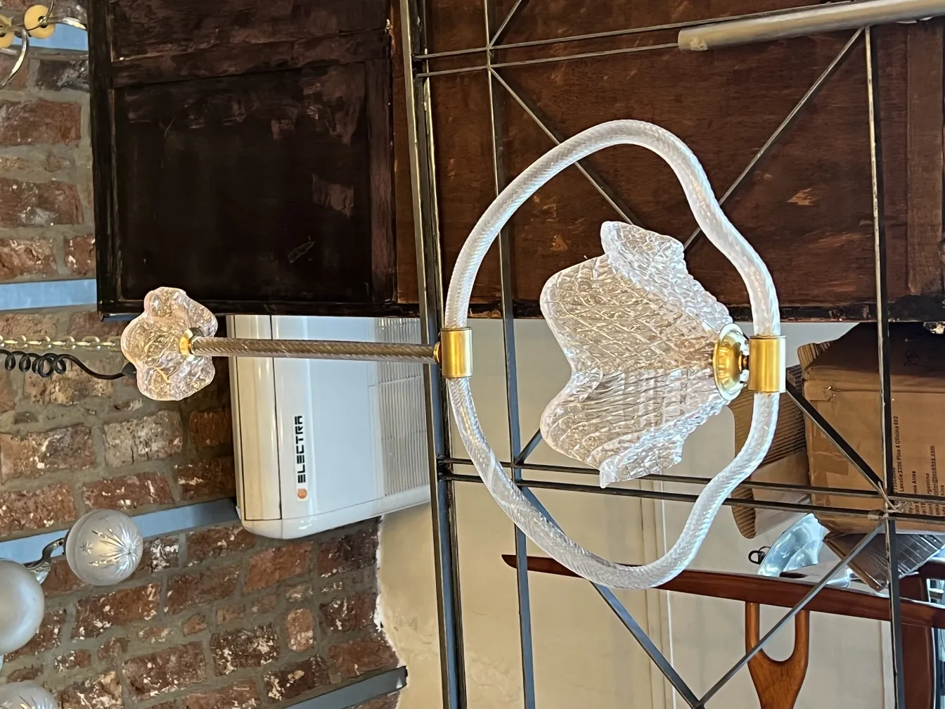 Antique hanging lamp with clear glass details in a rustic environment