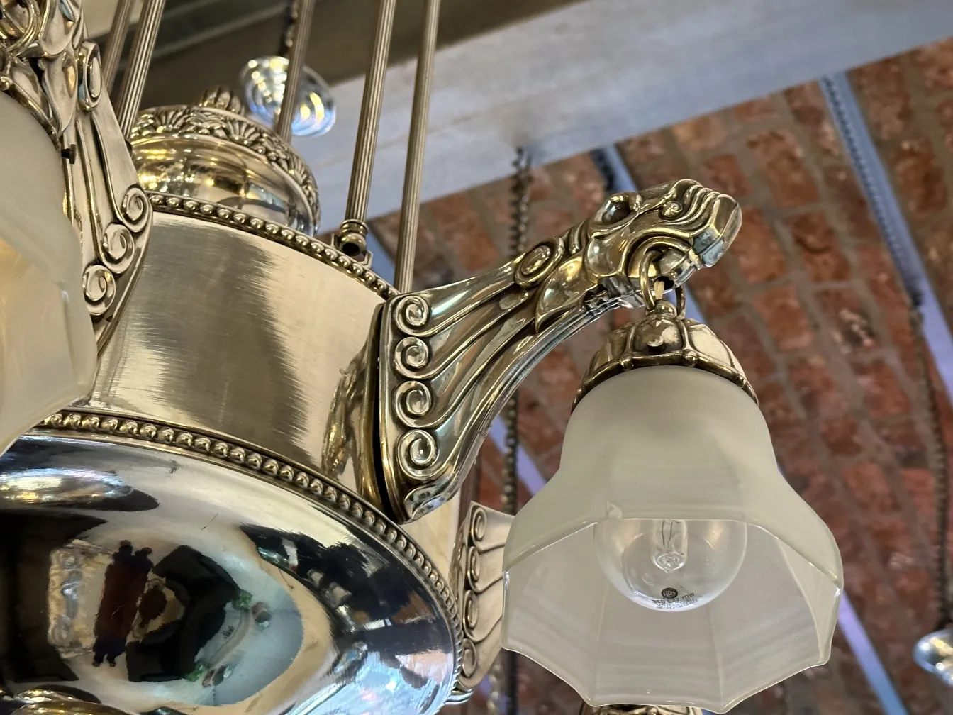 Antique hanging lamp with decorative details and shine