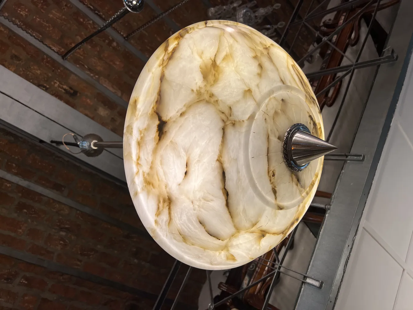 Antique hanging lamp with a unique design in light colors