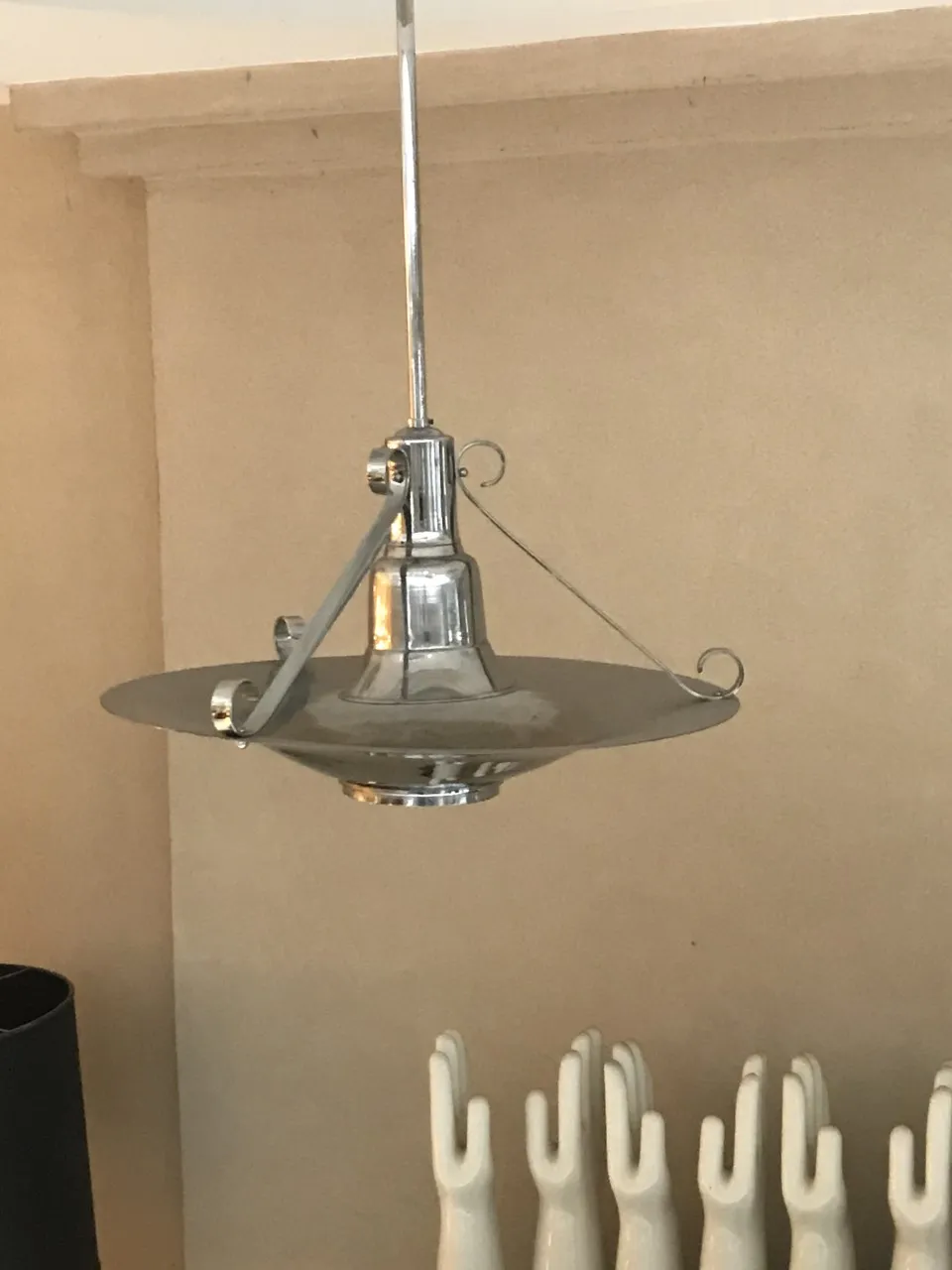 Antique hanging lamp with a bright chrome design