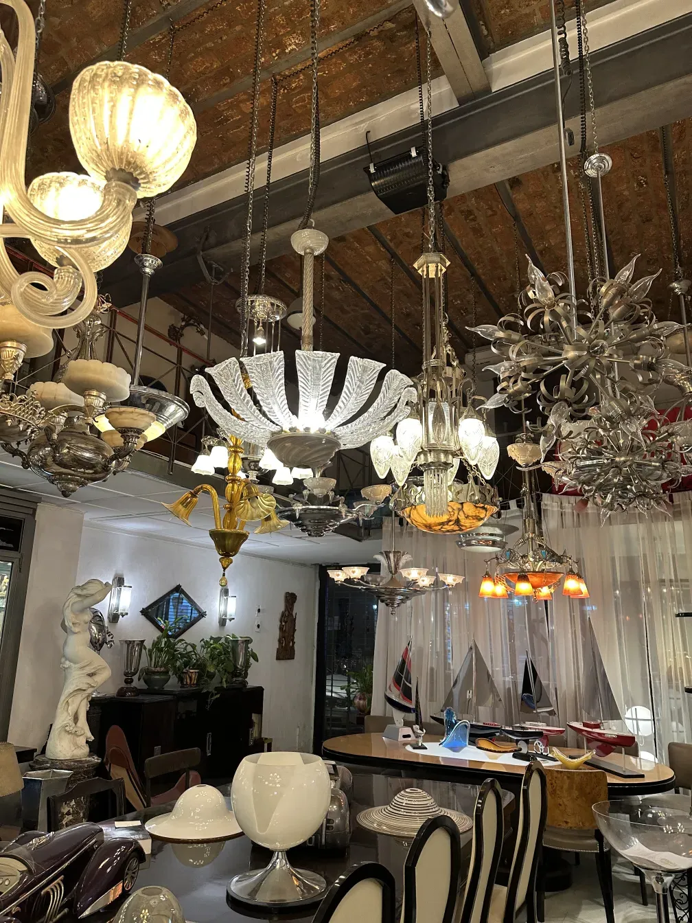 antique hanging lamp paolo venini with bright lights in an elegant setting