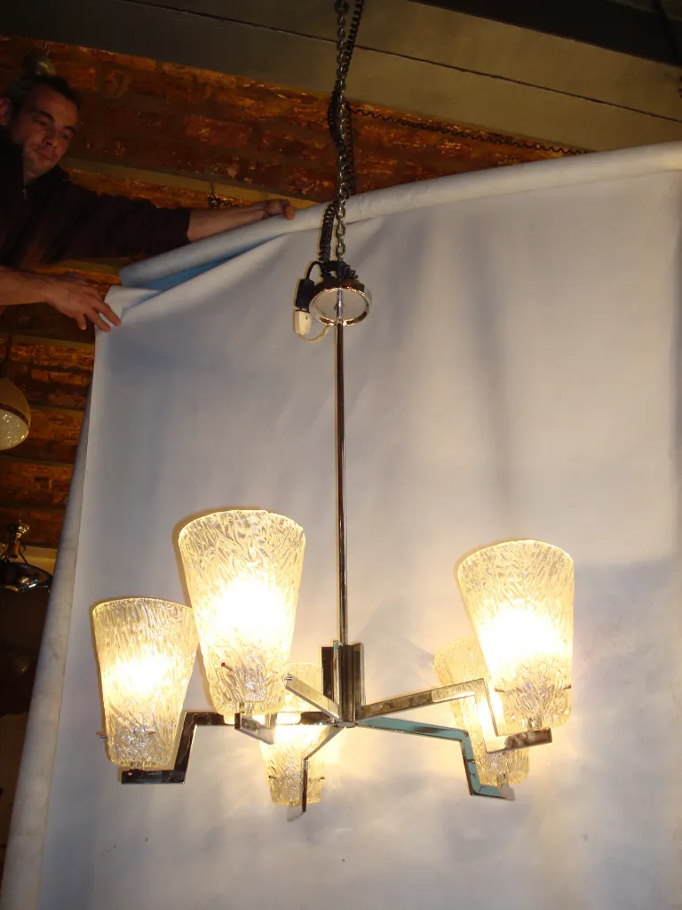 Antique hanging lamp with four illuminated shades, elegant style
