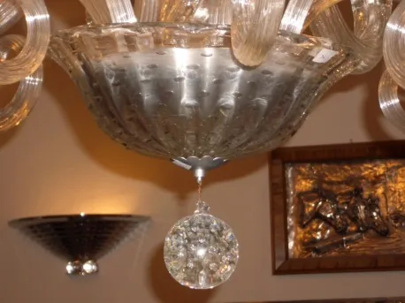 Antique hanging lamp with hanging crystal details.