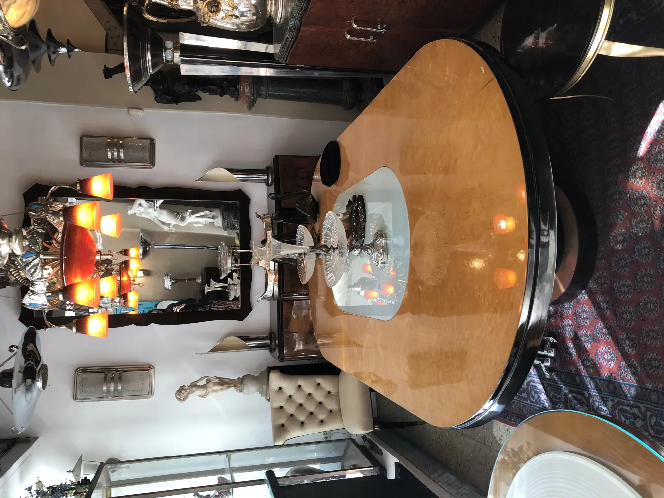 Antique hanging lamp with warm lights in an elegant setting.