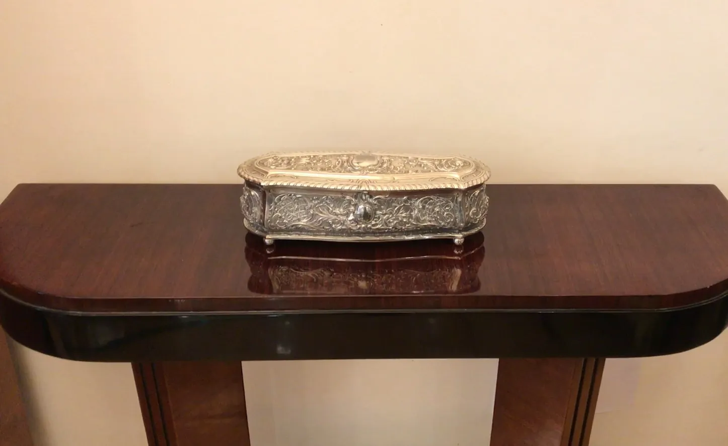 Antique decorated box on a wooden table
