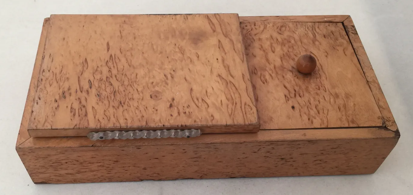 Antique wooden box with natural design and knob