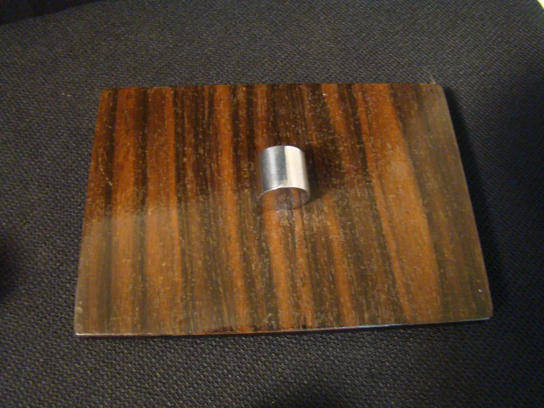 Antique wooden box with a simple and elegant design.