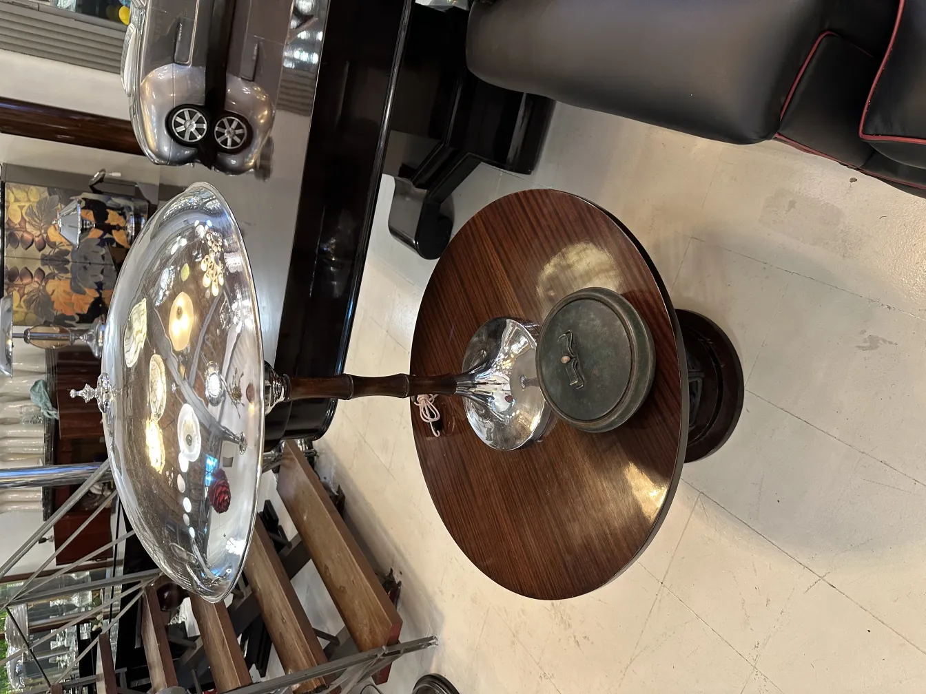 Antique storage box with a shiny lid and wooden base