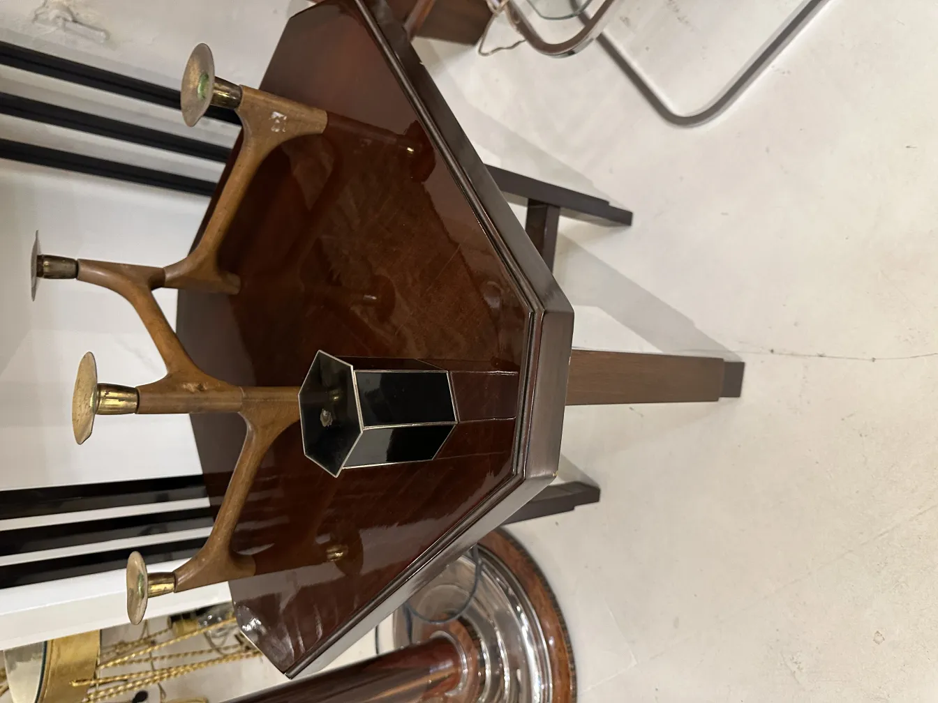Antique box with antler-shaped base and brown surface
