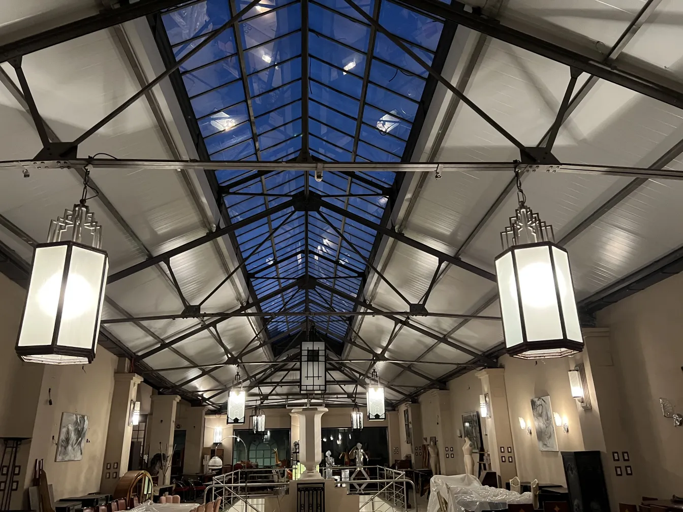 View of two antique hanging lanterns in an elegant setting