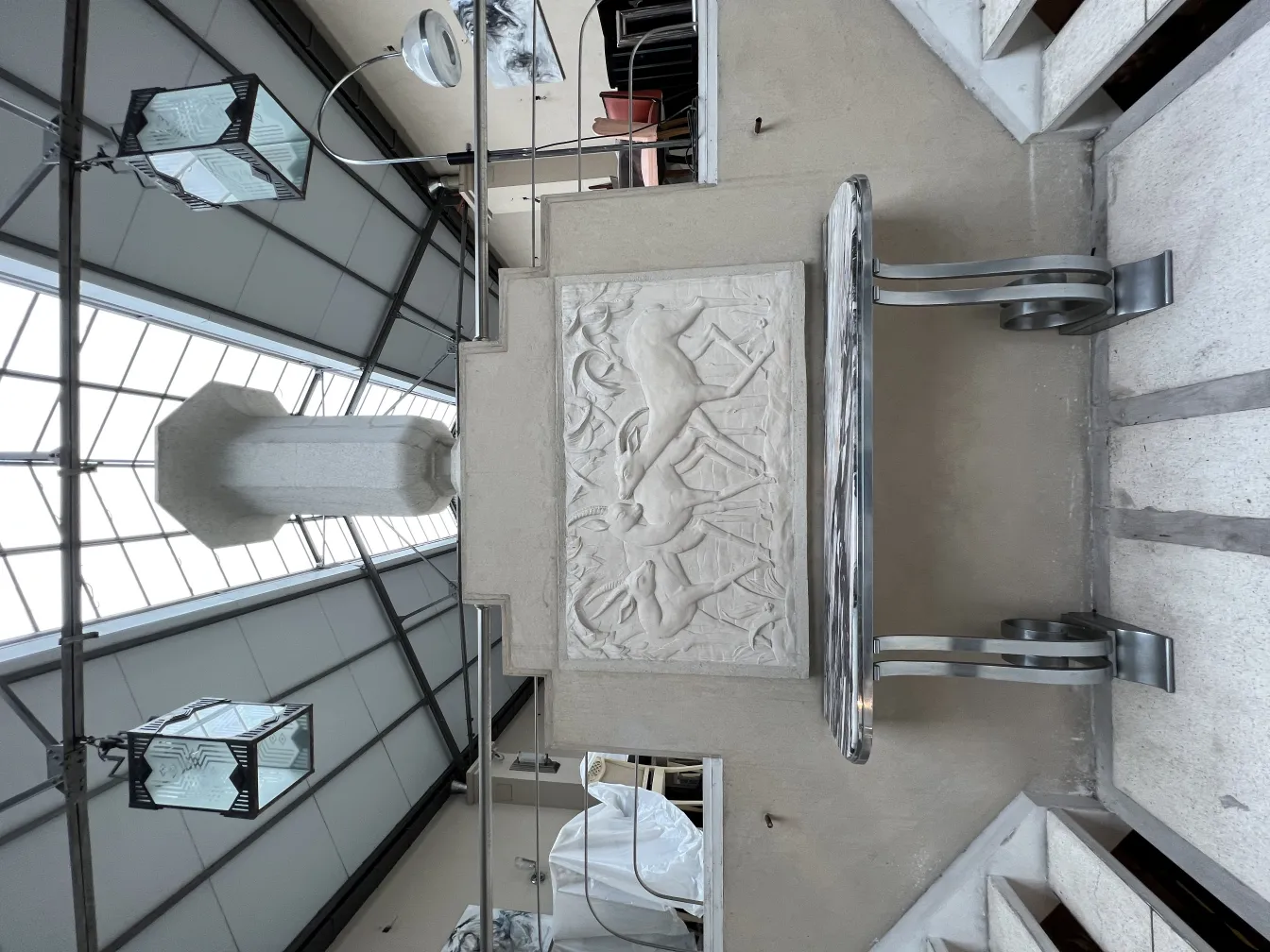 2 antique lanterns made of iron with a unique design in a modern environment