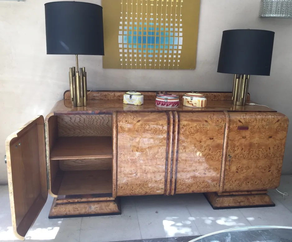 Antique wooden sideboard with elegant lamps