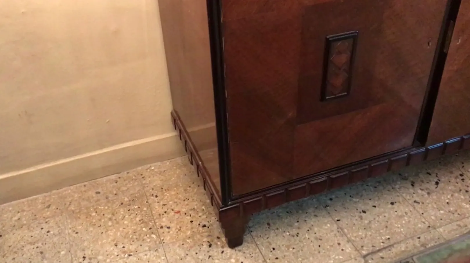 antique sideboard with decorative details in an elegant setting