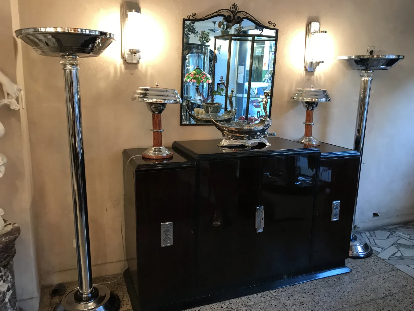 elegant antique sideboard with lamps and a mirror