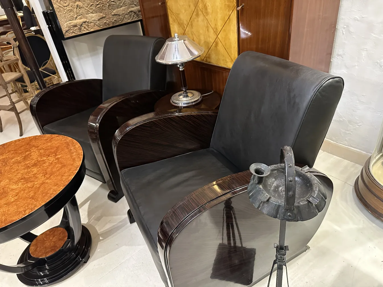 Antique standing ashtray with elegant design in a living space