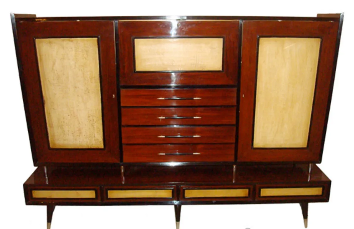 Antique bookcase with elegant shelves and finishes, perfect for storing books and decor.