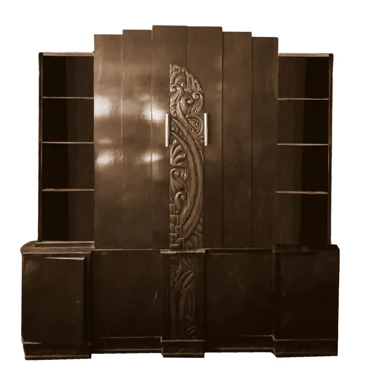 antique bookcase featuring carvings and open shelves