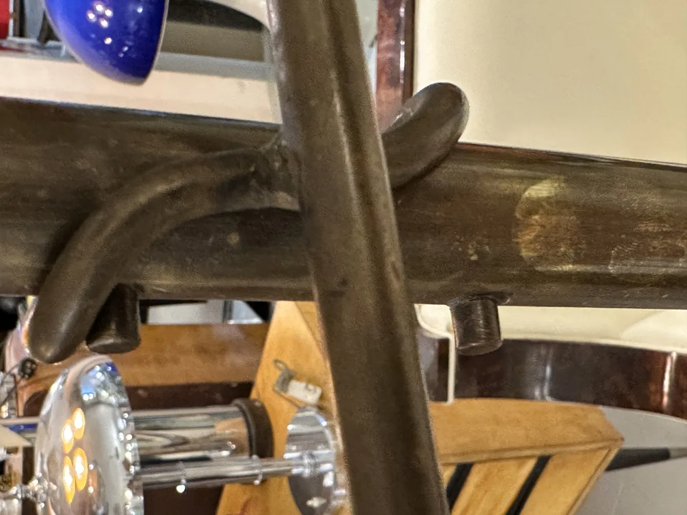 Antique floor lamp with decorative base and blue details.