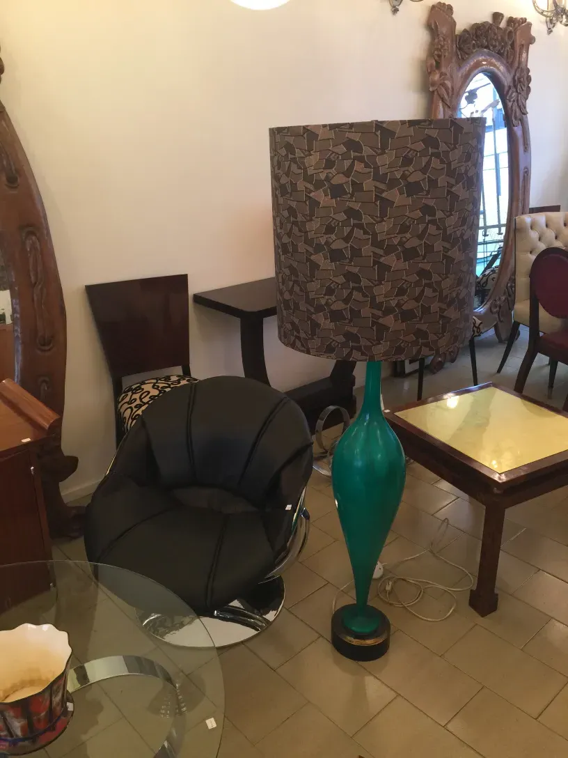 Antique floor lamp Georg Jansen with decorative shade in elegant room, cozy atmosphere.