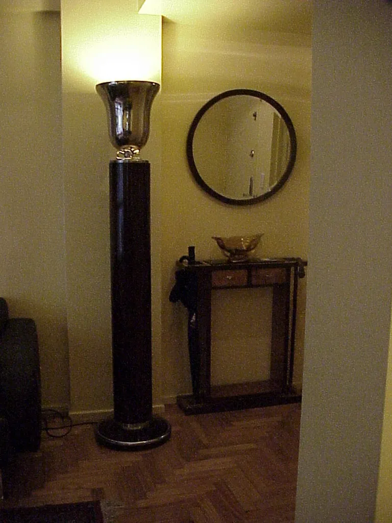 Antique floor lamp in a room with light wood and decorations