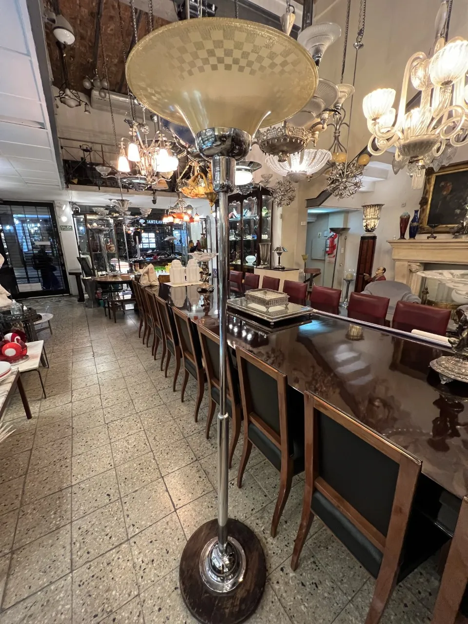 antique WMF floor lamp with circular base and large shade in a stylish setting