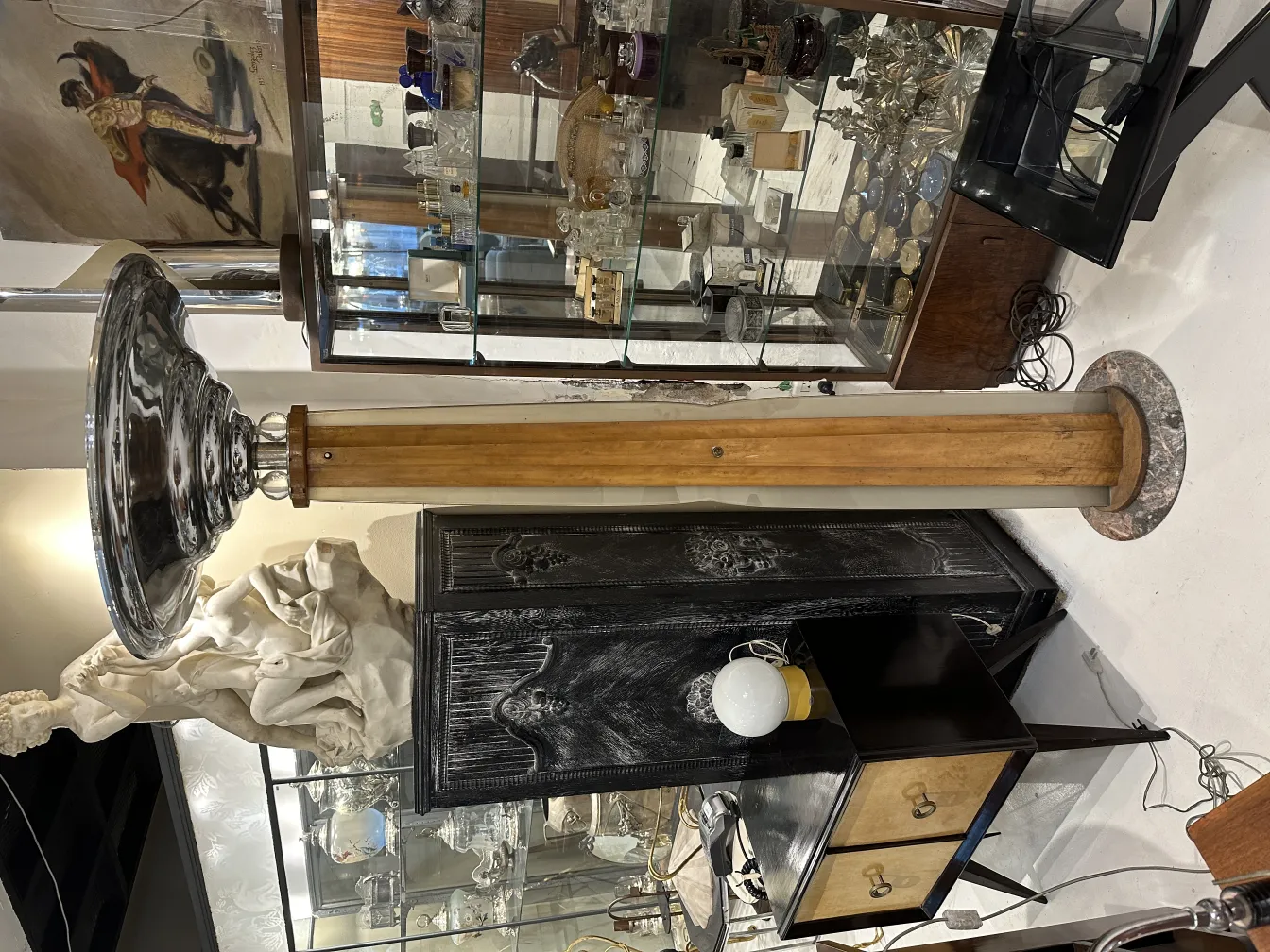 antique floor lamp with a shiny finish, in an elegant setting