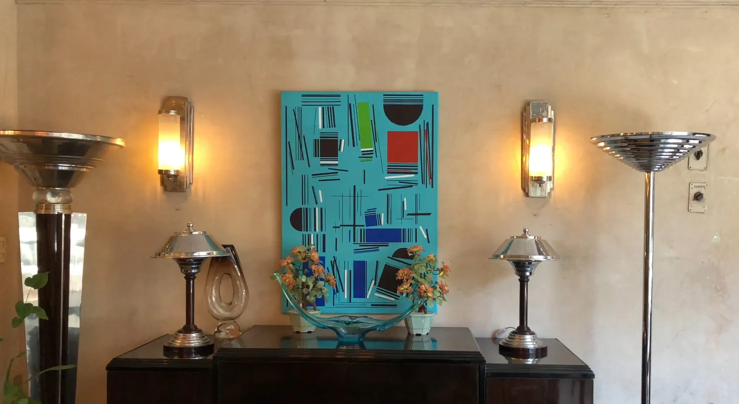 two antique floor lamps in a cozy setting