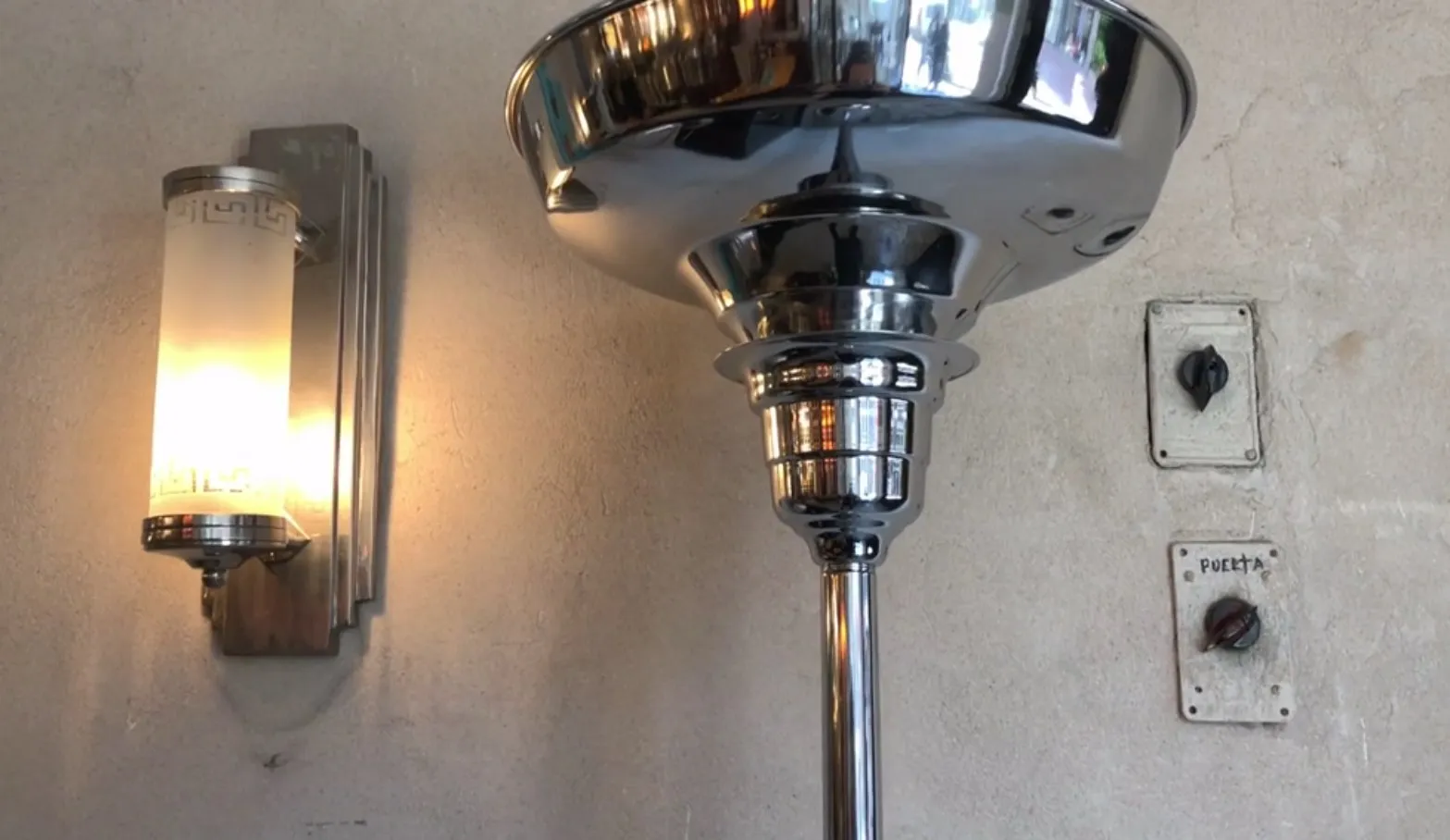 Set of two antique floor lamps in a stylish setting.