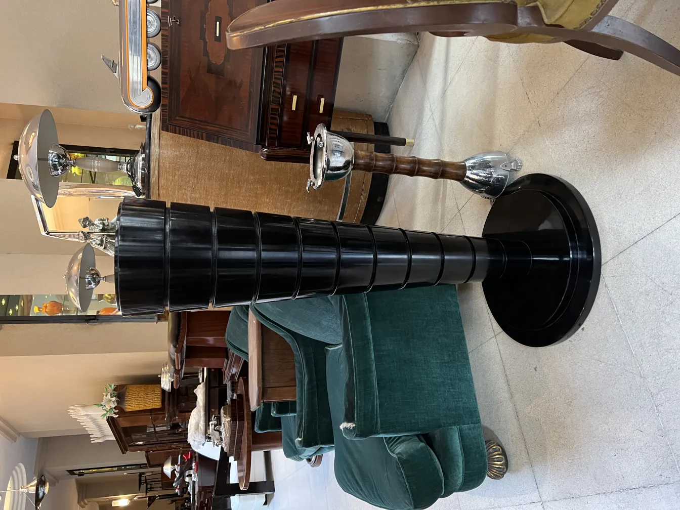Set of 2 antique floor lamps in a sophisticated environment.